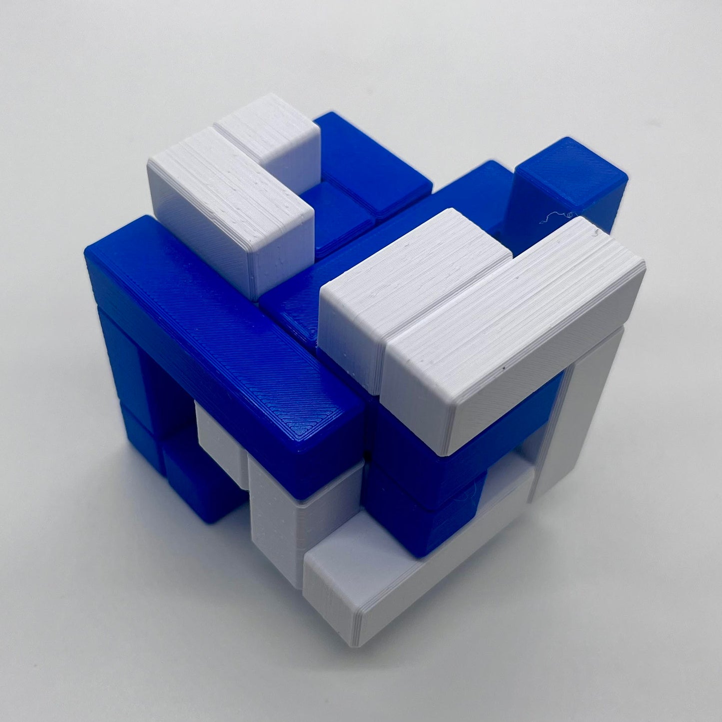 Download 3D Printable STL Files for Volume 1 of the 4 Piece Turning Interlocking Cube Puzzles